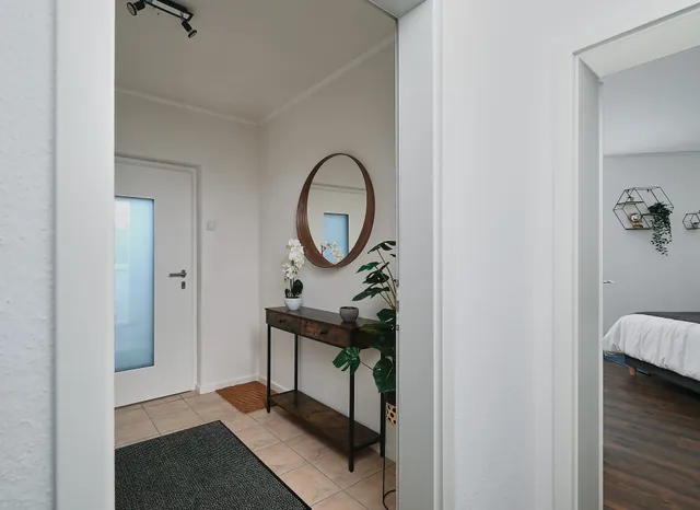 Welcoming entrance area of Mumo's Inn TLA apartment in Landstuhl