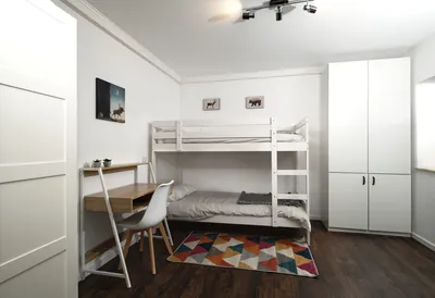 Second bedroom with bunk beds and Smart TV in TLA apartment near Ramstein Air Base