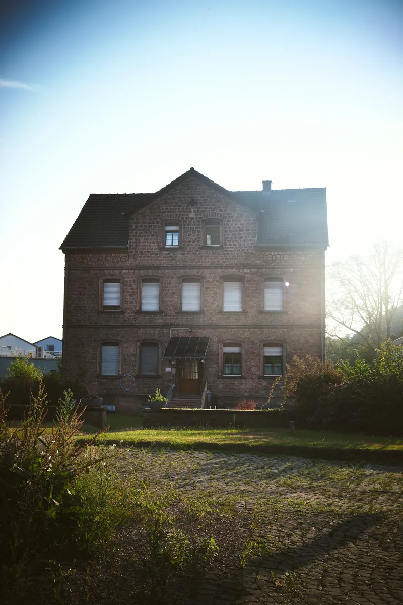 Sandstone house in Landstuhl, lit by evening sun