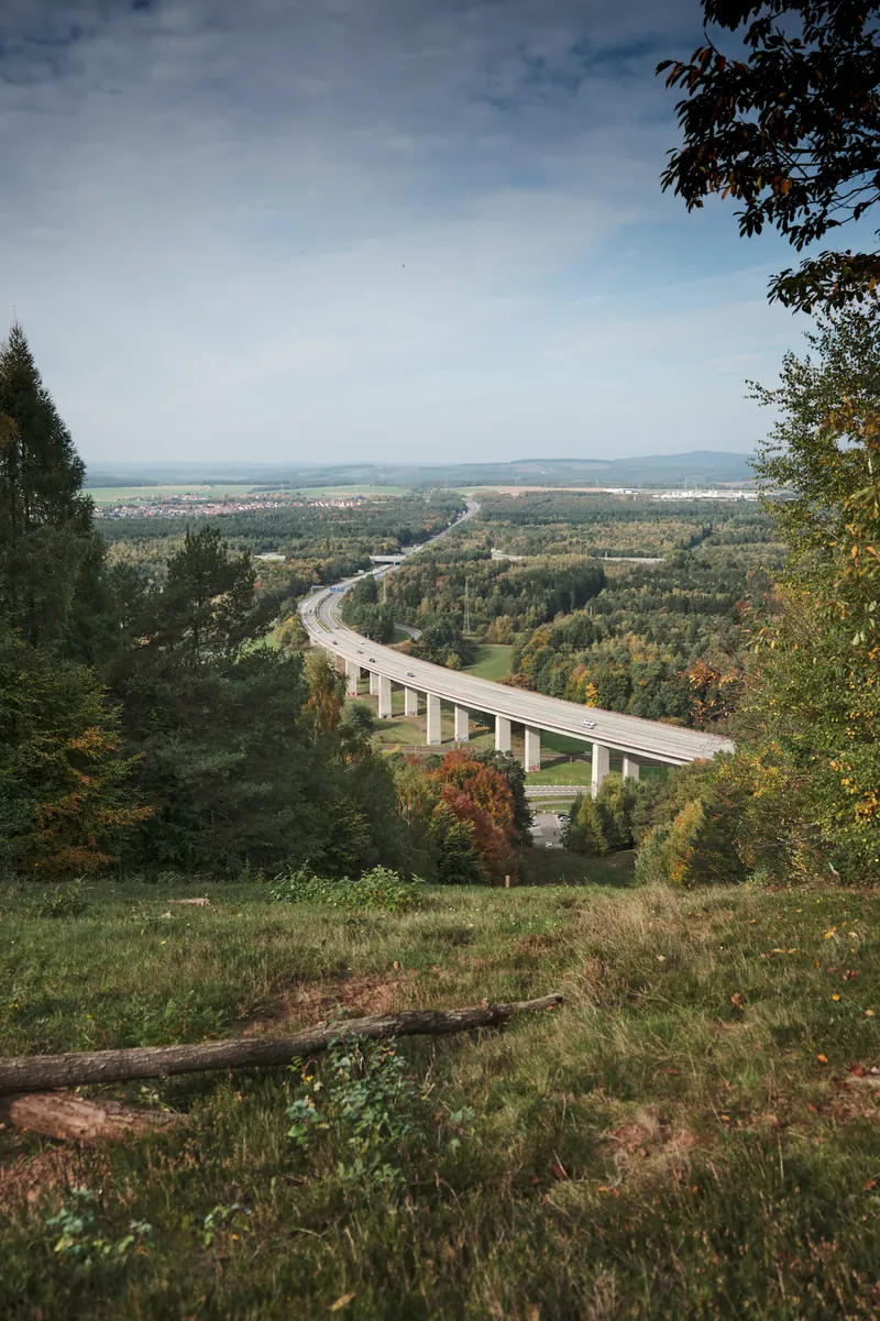 Motorway viaduct crossing a wooded valley near Landstuhl, seen from above